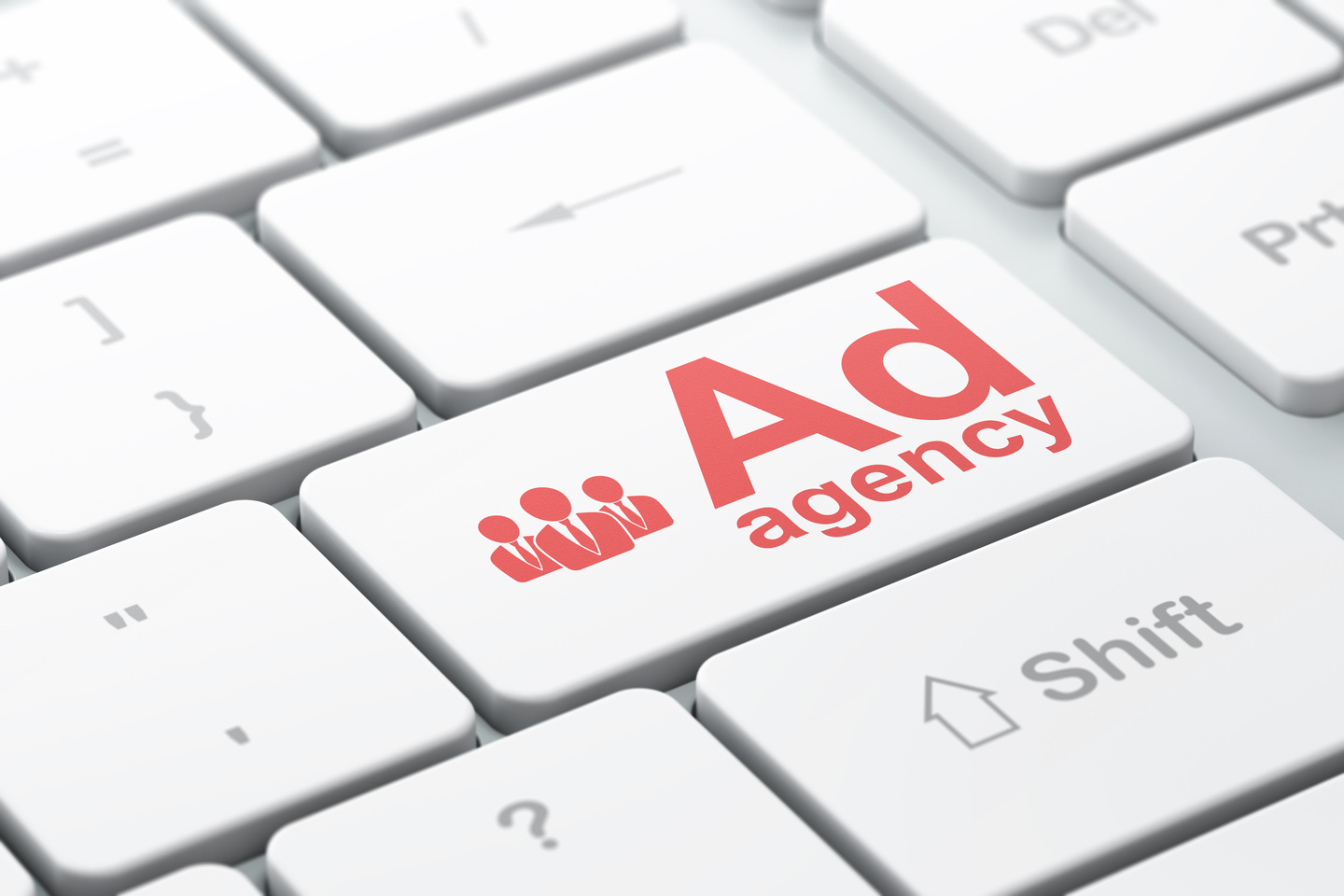 Marketing concept: Business People and Ad Agency on keyboard